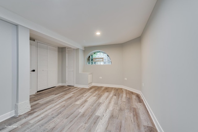5448 N Lieb Ave, Chicago, IL 60630 - unfurnished bedroom featuring light wood-style flooring, baseboards, and recessed lighting