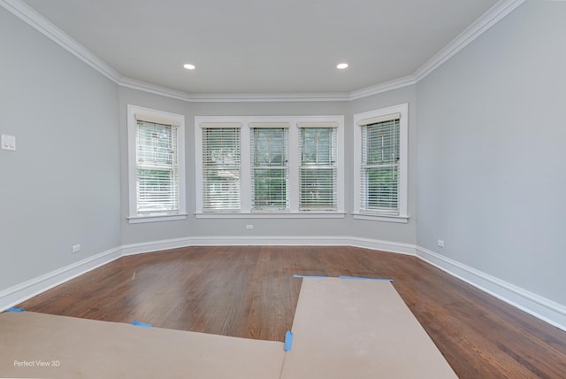 5448 N Lieb Ave, Chicago, IL 60630 - unfurnished room featuring ornamental molding, baseboards, wood finished floors, and recessed lighting