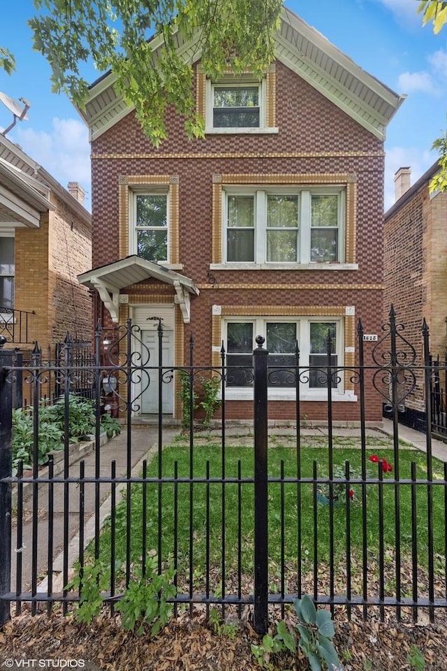 2625 S Drake Ave, Chicago, IL 60623 - view of front of property featuring brick siding and a fenced front yard