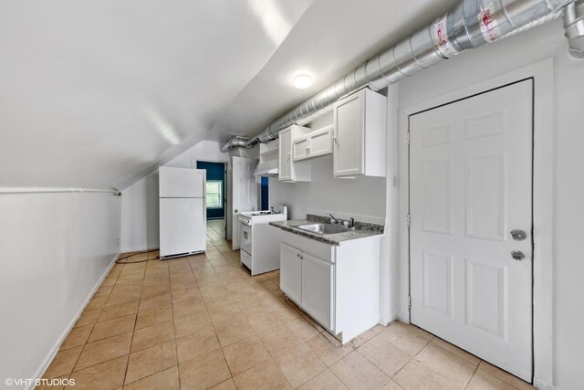2625 S Drake Ave, Chicago, IL 60623 - kitchen featuring white appliances, lofted ceiling, white cabinets, light tile patterned floors, and ventilation hood
