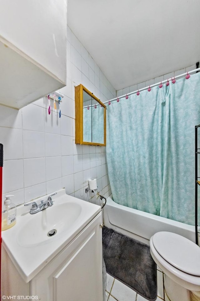 2625 S Drake Ave, Chicago, IL 60623 - full bath with tile walls, shower / bath combination with curtain, vanity, and decorative backsplash