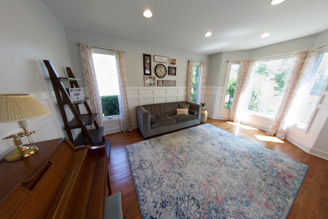 1034 Idaho St, Carol Stream, IL 60188 - living area featuring healthy amount of natural light, wainscoting, wood finished floors, recessed lighting, and a decorative wall