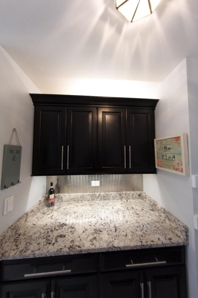 1034 Idaho St, Carol Stream, IL 60188 - kitchen with dark cabinets and light stone countertops