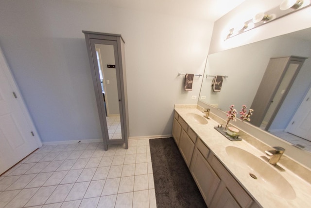 1034 Idaho St, Carol Stream, IL 60188 - bathroom with double vanity, tile patterned flooring, and baseboards
