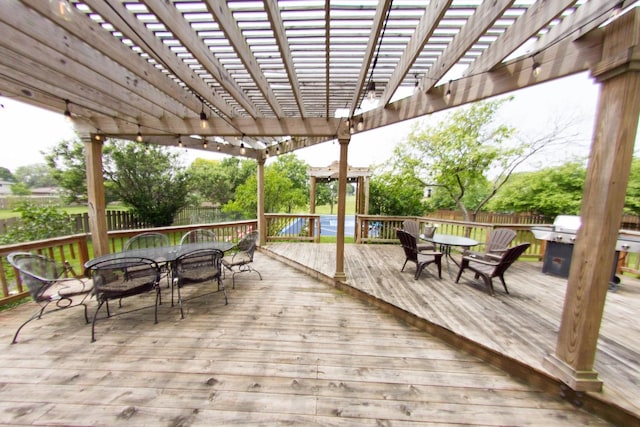 1034 Idaho St, Carol Stream, IL 60188 - wooden deck with outdoor dining space, a fenced backyard, and a pergola