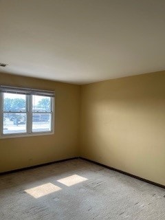 10936 S Keating Ave Unit 3C, Oak Lawn, IL 60453 - unfurnished room with light carpet and baseboards