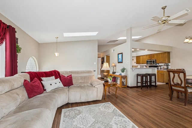 19927 S Edinburgh Ln Unit 0, Frankfort, IL 60423 - living area featuring lofted ceiling, a skylight, dark wood finished floors, and a ceiling fan