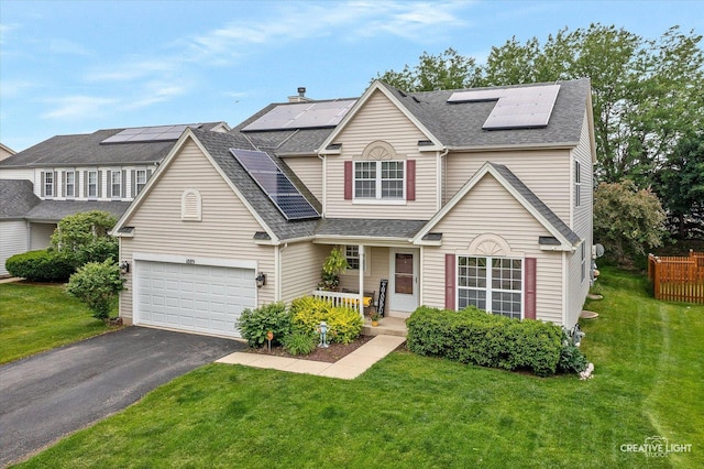 1889 Shore Line Ct, Romeoville, IL 60446 - traditional home featuring solar panels, driveway, a shingled roof, and a porch