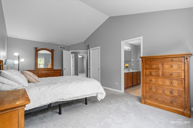 1889 Shore Line Ct, Romeoville, IL 60446 - bedroom featuring vaulted ceiling, light carpet, ensuite bathroom, and a closet
