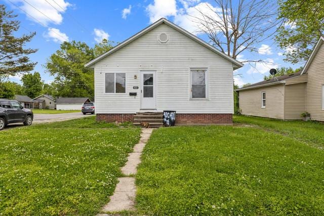 420 N 9th St, Herrin, IL 62948 - rear view of house with entry steps and a yard