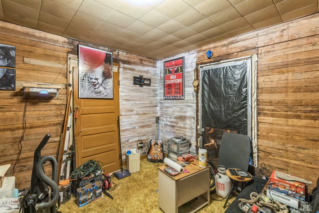 420 N 9th St, Herrin, IL 62948 - miscellaneous room featuring wooden walls and carpet