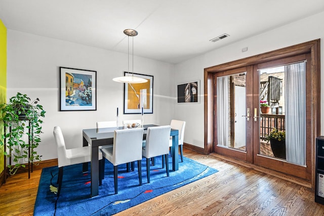 4413 N Malden St Unit 2S, Chicago, IL 60640 - dining area featuring wood finished floors and french doors