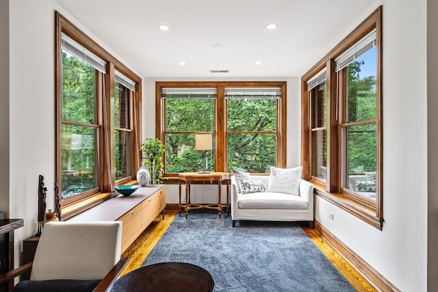 4413 N Malden St Unit 2S, Chicago, IL 60640 - sitting room with healthy amount of natural light, wood finished floors, and recessed lighting