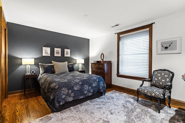 4413 N Malden St Unit 2S, Chicago, IL 60640 - bedroom with baseboards and wood finished floors
