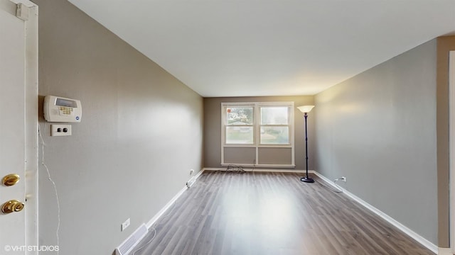 1917 W 163rd St, Markham, IL 60428 - spare room featuring wood finished floors and baseboards