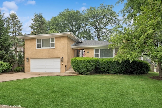 504 S Spring Ave, La Grange, IL 60525 - tri-level home featuring brick siding, a garage, and a front lawn