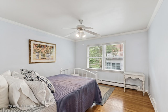 504 S Spring Ave, La Grange, IL 60525 - bedroom with a baseboard radiator, wood finished floors, ornamental molding, and a ceiling fan