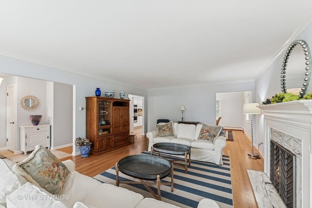 504 S Spring Ave, La Grange, IL 60525 - living area featuring light wood finished floors, ornamental molding, and a premium fireplace