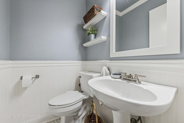 504 S Spring Ave, La Grange, IL 60525 - half bath featuring toilet and a wainscoted wall