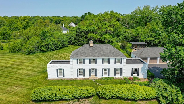 1596 W Palatine Rd, Inverness, IL 60067 - view of front of property with a chimney and a front lawn