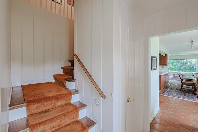1596 W Palatine Rd, Inverness, IL 60067 - stairway with a decorative wall, crown molding, and tile patterned flooring
