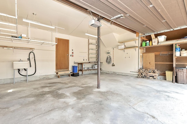 3619 Overlook Dr, Richmond, IL 60071 - garage featuring a garage door opener