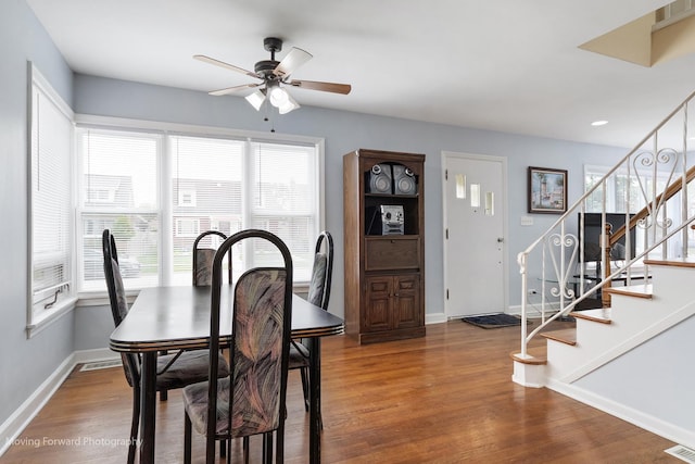 7324 W 56th Pl, Summit, IL 60501 - dining area featuring ceiling fan, wood finished floors, stairway, and recessed lighting