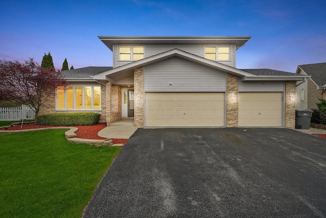 9028 Robin Ct, Orland Hills, IL 60487 - view of front of house with brick siding, driveway, a garage, and a shingled roof