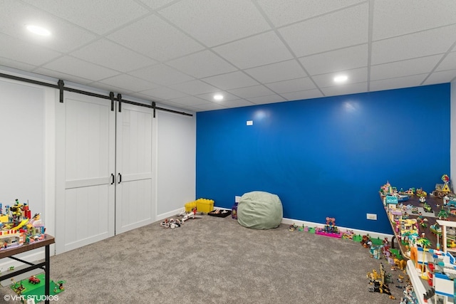 612 Pine View Pass, Lake Villa, IL 60046 - rec room with carpet, a barn door, recessed lighting, and a paneled ceiling