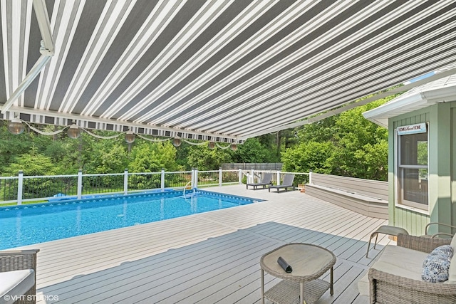 612 Pine View Pass, Lake Villa, IL 60046 - view of pool with a wooden deck and view of wooded area