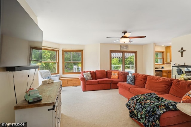 612 Pine View Pass, Lake Villa, IL 60046 - carpeted living area with healthy amount of natural light and a ceiling fan