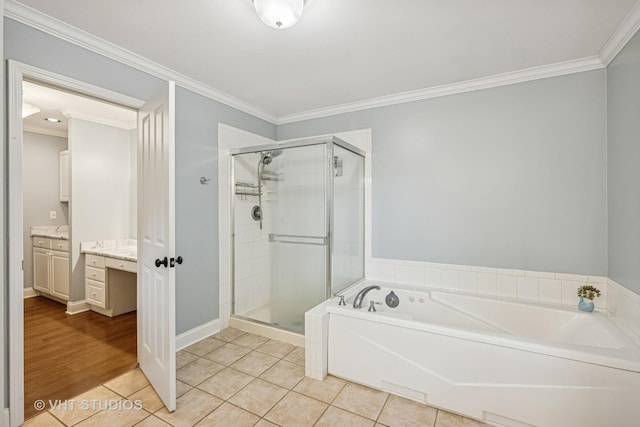 436 Kelly Ln, Crystal Lake, IL 60012 - bathroom with vanity, a garden tub, a stall shower, tile patterned floors, and crown molding