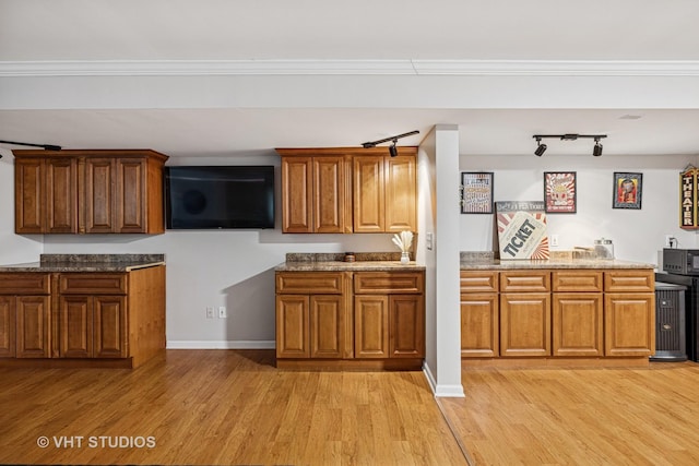 436 Kelly Ln, Crystal Lake, IL 60012 - kitchen featuring brown cabinets and light wood-style flooring