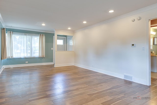 4519 W Shore Dr, Mchenry, IL 60050 - spare room with crown molding, hardwood / wood-style floors, a smoke detector, and recessed lighting