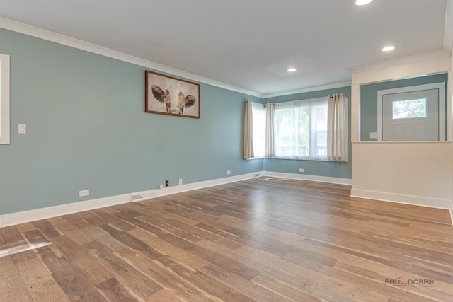 4519 W Shore Dr, Mchenry, IL 60050 - spare room featuring crown molding, hardwood / wood-style floors, plenty of natural light, and recessed lighting