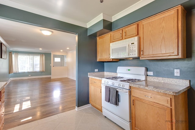 4519 W Shore Dr, Mchenry, IL 60050 - kitchen featuring white appliances, light countertops, crown molding, open floor plan, and recessed lighting