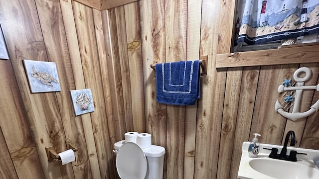 963 Oneida St, Joliet, IL 60435 - half bathroom with toilet and wood walls