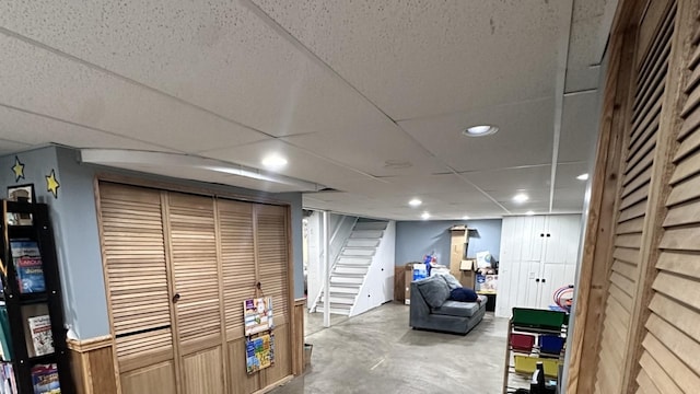 963 Oneida St, Joliet, IL 60435 - recreation room featuring concrete flooring, a drop ceiling, and recessed lighting