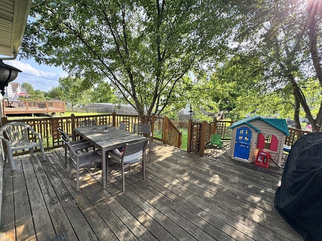 1419 Major Dr, Plainfield, IL 60586 - wooden deck featuring outdoor dining space and a fenced backyard