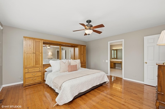 1370 Glacier Pkwy, Algonquin, IL 60102 - bedroom featuring light wood-type flooring, baseboards, a ceiling fan, and ensuite bath