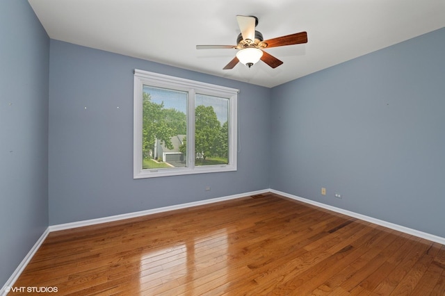 1370 Glacier Pkwy, Algonquin, IL 60102 - empty room with wood finished floors, ceiling fan, and baseboards