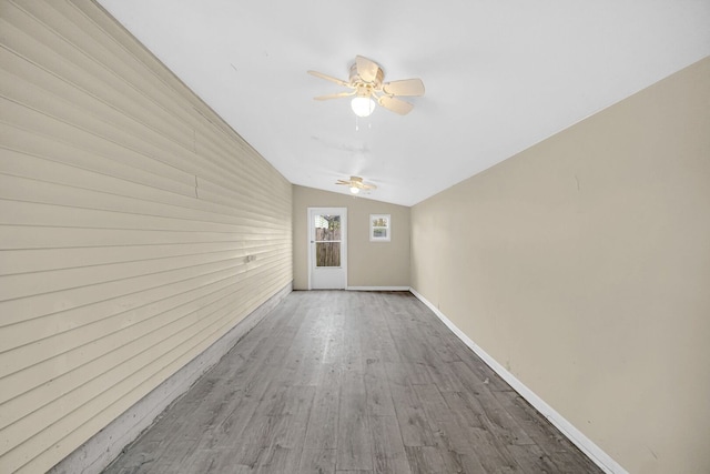2327 W 157th Pl, Markham, IL 60428 - interior space with vaulted ceiling, a ceiling fan, wood finished floors, and baseboards