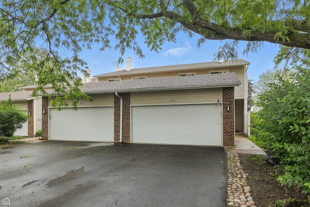 421 Pintail Ln, Deerfield, IL 60015 - garage featuring asphalt driveway