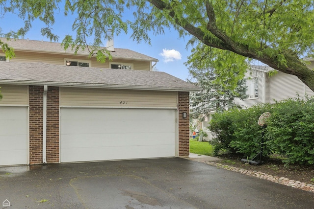 421 Pintail Ln, Deerfield, IL 60015 - garage with asphalt driveway