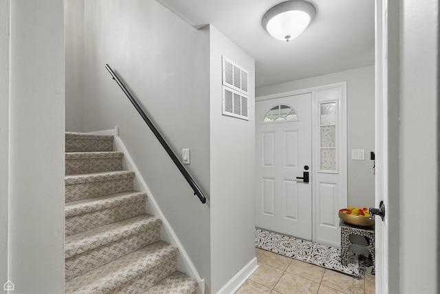 421 Pintail Ln, Deerfield, IL 60015 - entryway featuring stairs, light tile patterned flooring, and baseboards