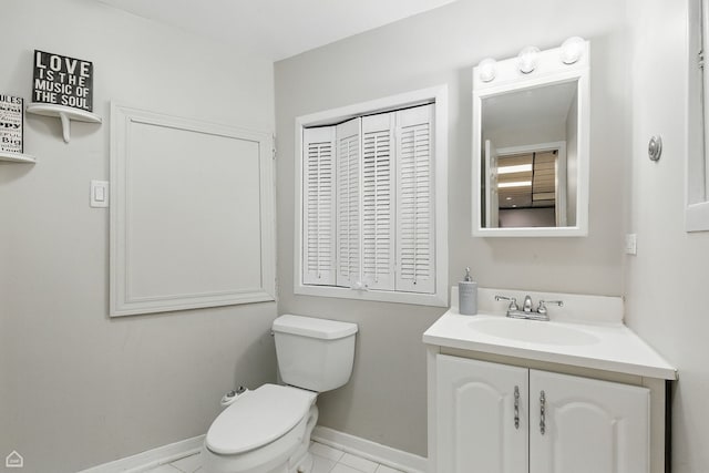 421 Pintail Ln, Deerfield, IL 60015 - bathroom featuring toilet, vanity, and baseboards