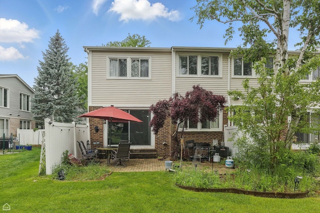 421 Pintail Ln, Deerfield, IL 60015 - back of property featuring brick siding and a patio area