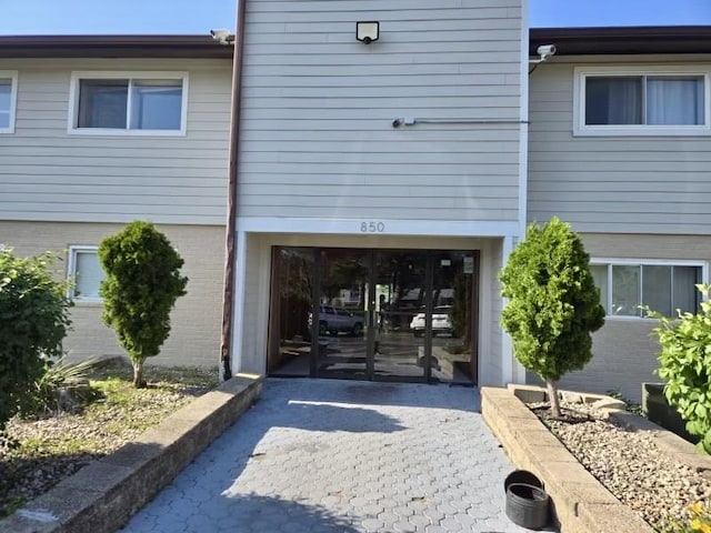 850 E Old Willow Rd Unit 119, Prospect Heights, IL 60070 - entrance to property with brick siding and french doors