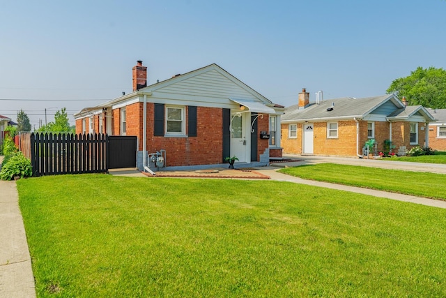 9727 Richard Ave, Franklin Park, IL 60131 - view of front of property with brick siding and a chimney