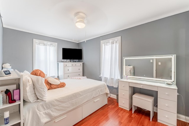 9727 Richard Ave, Franklin Park, IL 60131 - bedroom with light wood finished floors, ornamental molding, and baseboards